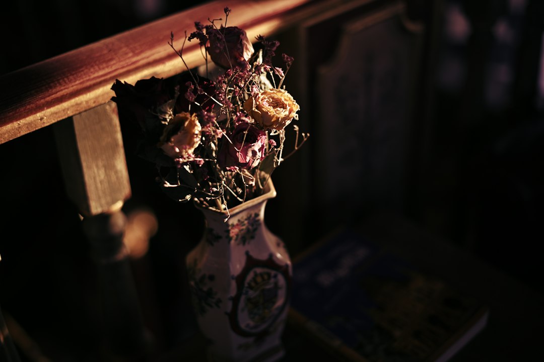 Dark toned dried flowers in a warm moody still life