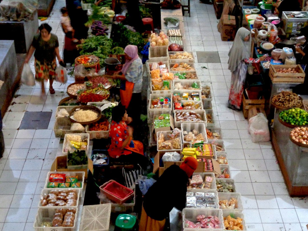 A traditional market scene at Pasar Gading in Surakarta, Indonesia.